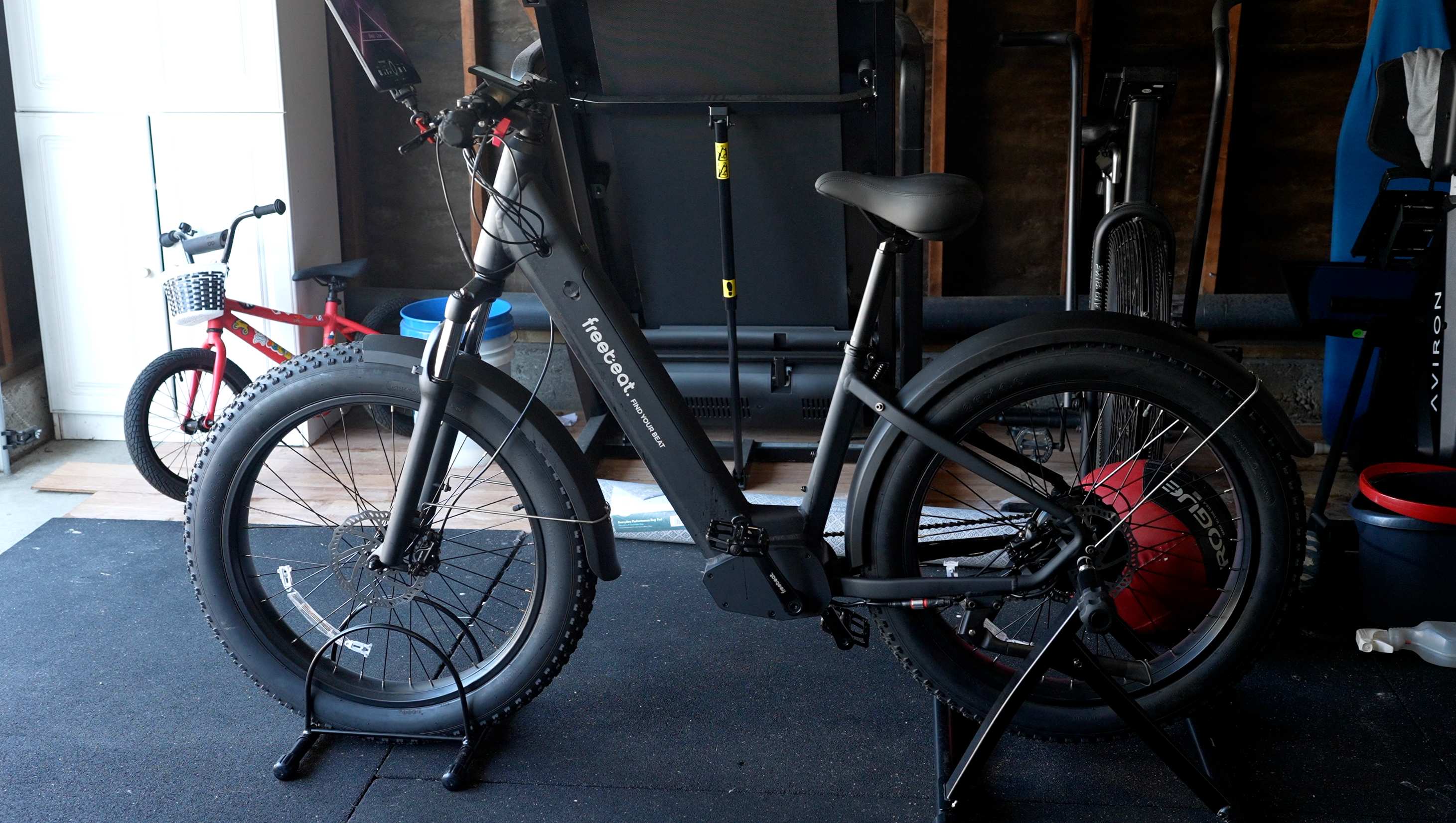 a bicycle parked on the side of a building