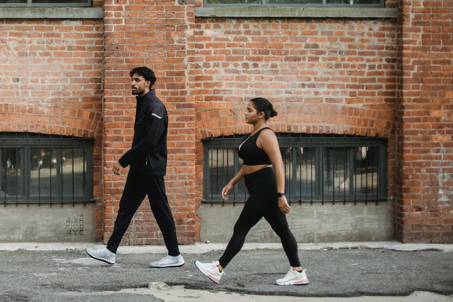 photo of a man and a woman wearing sports clothing