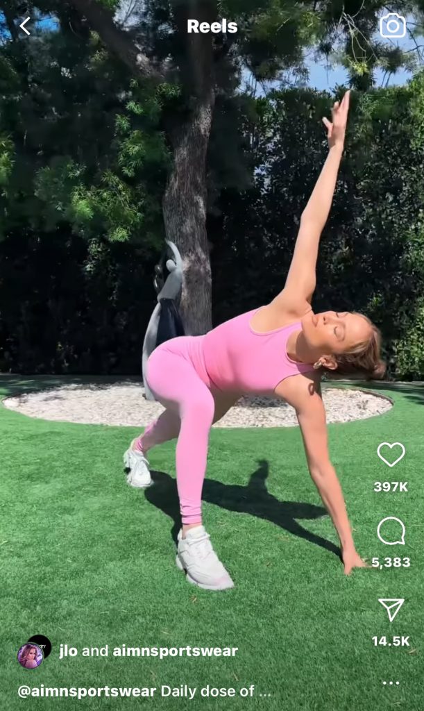 a woman throwing a frisbee