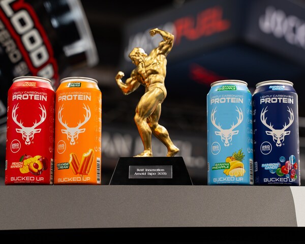 A trophy and several cans of protein