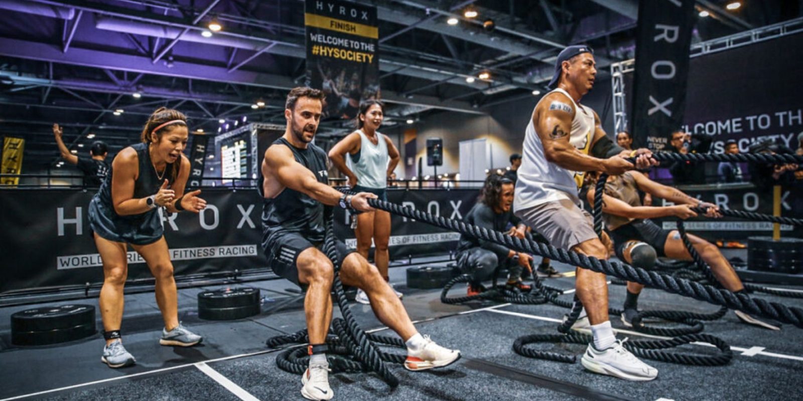 A group of people working out with ropes