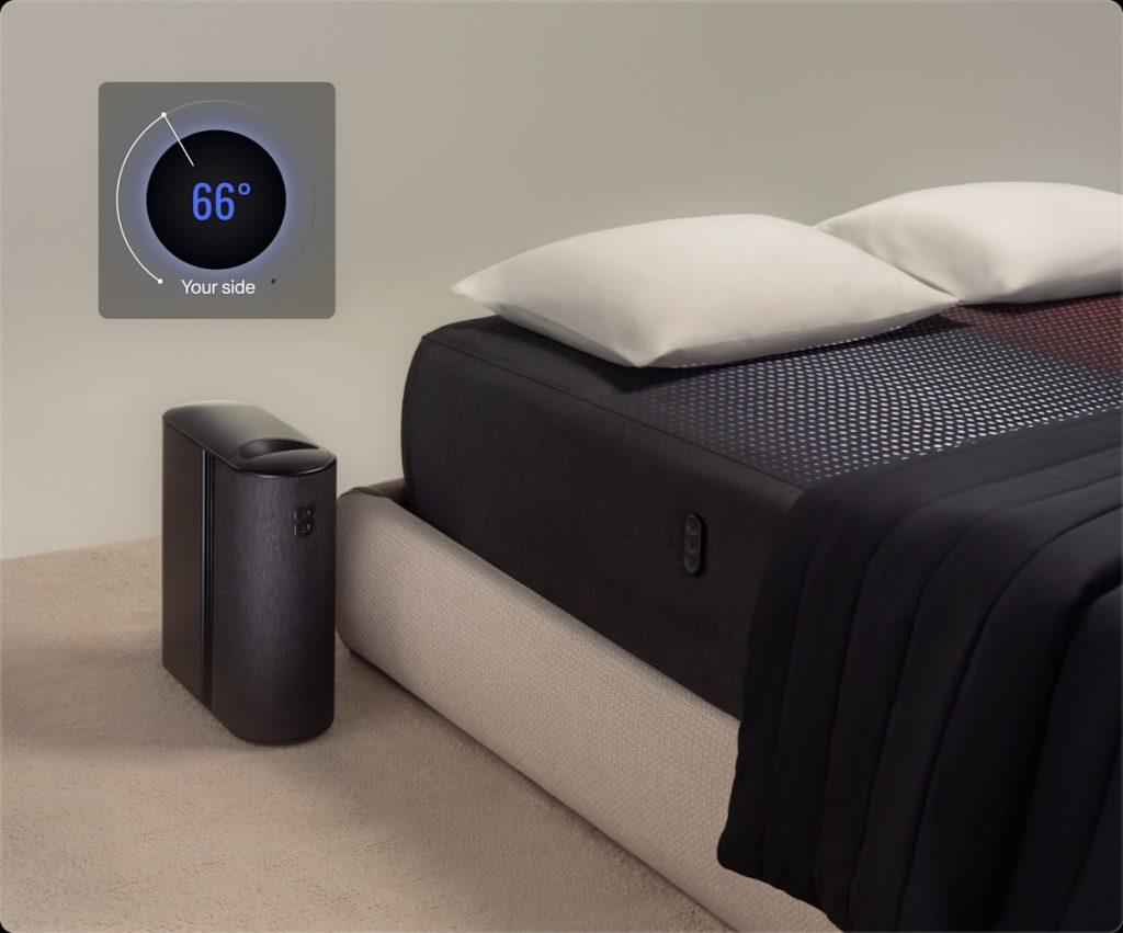 A black box next to a bed