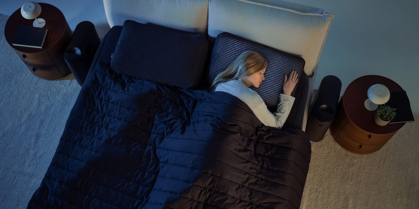 A woman sleeping on a bed